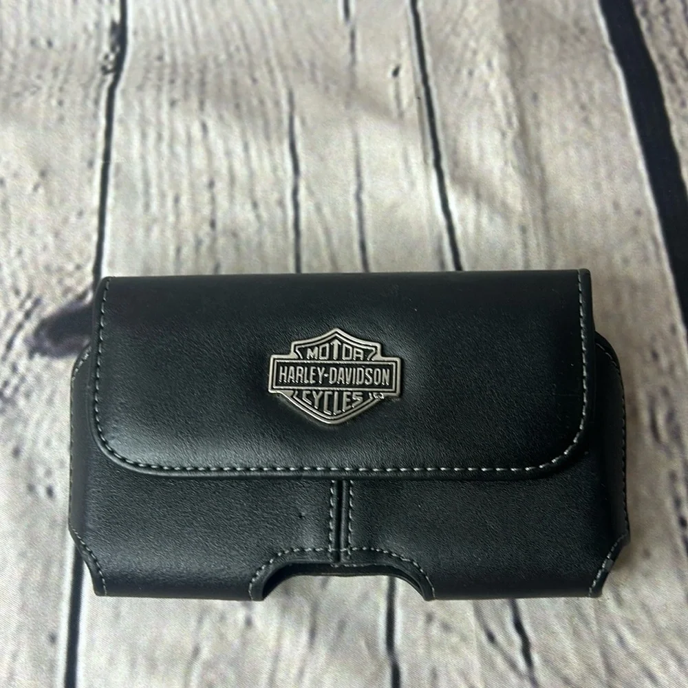 Harley Davidson phone case/ magnetic/ 5 inches wider 2.5 high/ black.looks new
